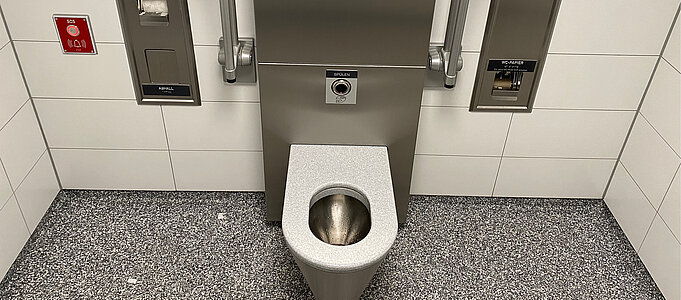 Interior of a restroom facility, toilet