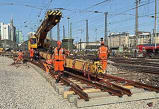 Track construction crane with Turnout 