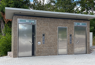 Restroom facility with a sandstone facade
