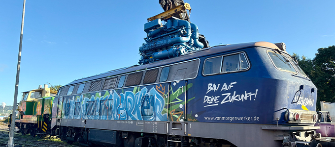 Engine being installed into the locomotive
