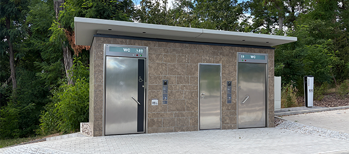 Restroom facility with a sandstone facade