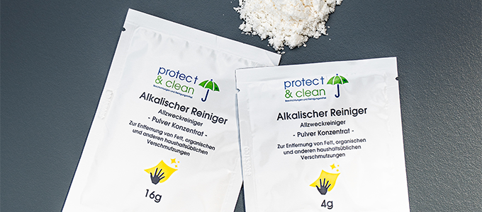 Powdered alkaline cleaner