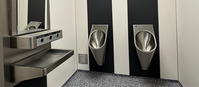 Urinal room with two urinals